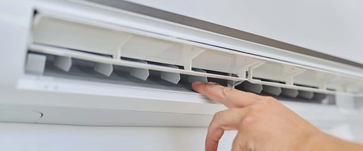 installing-an-air-conditioner-in-an-apartment-offi-2022-03-14-19-25-40-utc-min-min.jpg